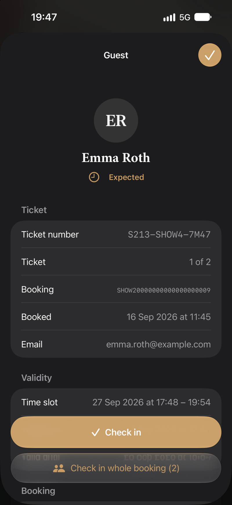 Guest detail view with ticket number, booking, time slot and the buttons “Check in” and “Check in whole booking”.